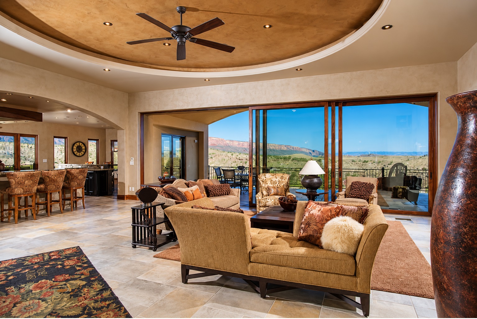 Multi Sliding Doors Boise, ID creating a seamless transition between an open living space and scenic outdoor patio